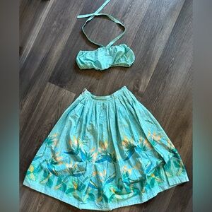 Di Brooks of OuterLimitz XS Teal Tiki Skirt & Top Set